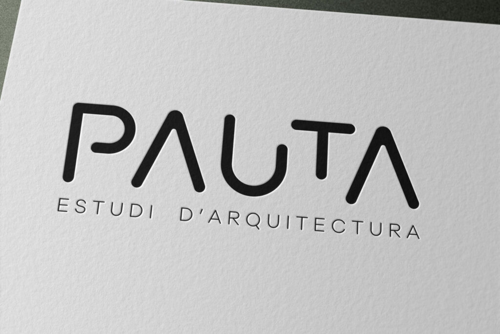 Logotipo de PAUTA impreso sobre papel blanco