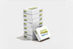 Aplicació del logotip SPORE-MED a caixes